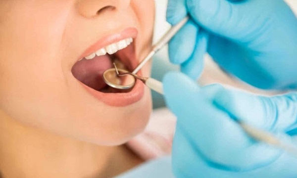What causes root canal pain and infection?